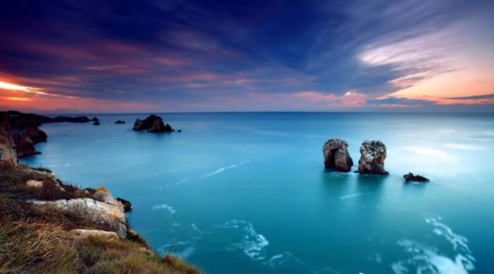 A serene view of the ocean, showcasing its beauty and tranquility, inviting one to experience its calming presence