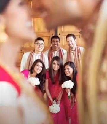 A diverse group of individuals dressed in vibrant traditional Indian attire, showcasing cultural richness and unity.