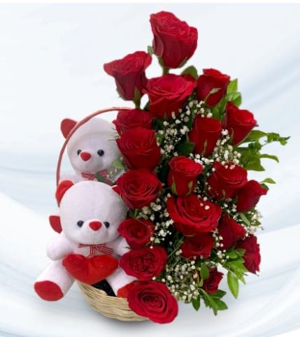 A lovely basket showcasing bright red roses paired with an adorable teddy bear, perfect for expressing affection.